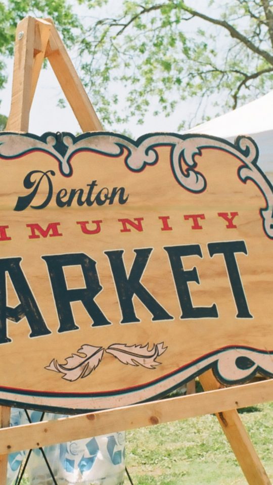 Denton community market sign
